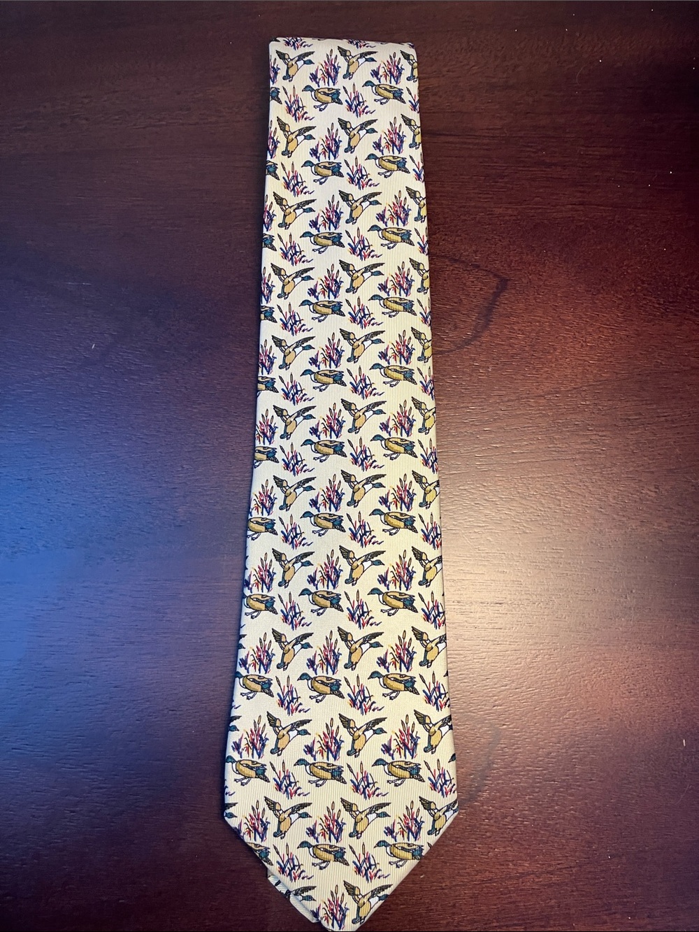 Holland & Holland Men's Cream silk tie with duck pattern made in England.